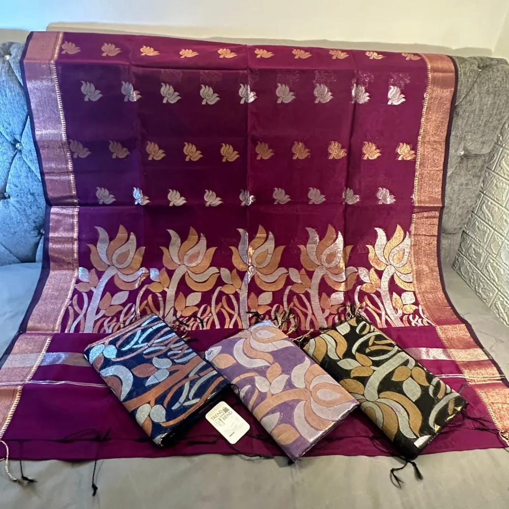 Graceful Magenta Silk Saree with Lotus Motifs and Lustrous Borders