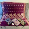 Graceful Magenta Silk Saree with Lotus Motifs and Lustrous Borders