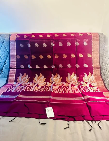 Graceful Magenta Silk Saree with Lotus Motifs and Lustrous Borders